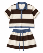 A two-piece womens outfit set featuring a short-sleeve polo shirt and matching drawstring skirt. The set has horizontal stripes in dark brown and cream, with a blue collar, placket, hem, and elastic waistband.
